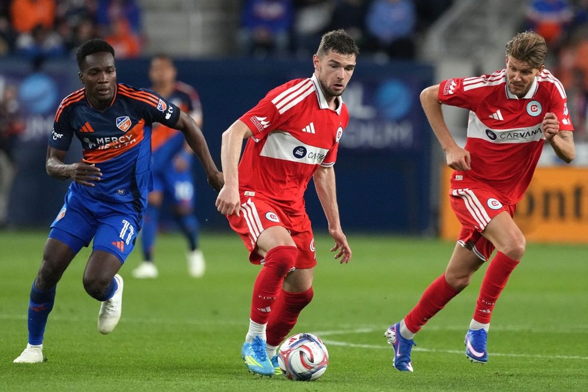 Apr 18, 2026; Cincinnati, Ohio, USA; Chicago Fire FC forward Hugo Cuypers (9) (center) dribbles forward during the second half of an MLS match against FC Cincinnati at TQL Stadium. Mandatory Credit: Kareem Elgazzar-Imagn Images