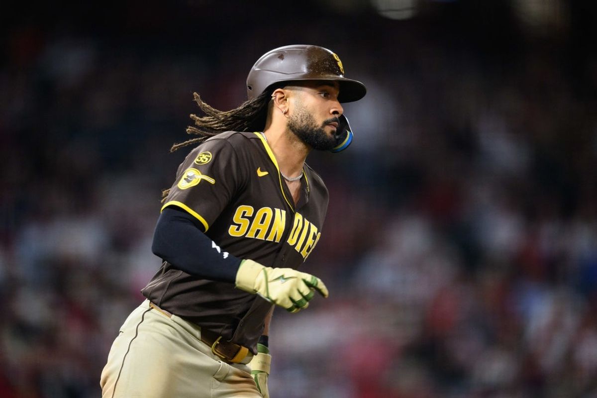 Apr 18, 2026; Anaheim, California, USA; San Diego Padres right fielder Fernando Tatis Jr. (23) runs after hitting a RBI single during the ninth inning against the Los Angeles Angels at Angel Stadium. Mandatory Credit: William Liang-Imagn Images