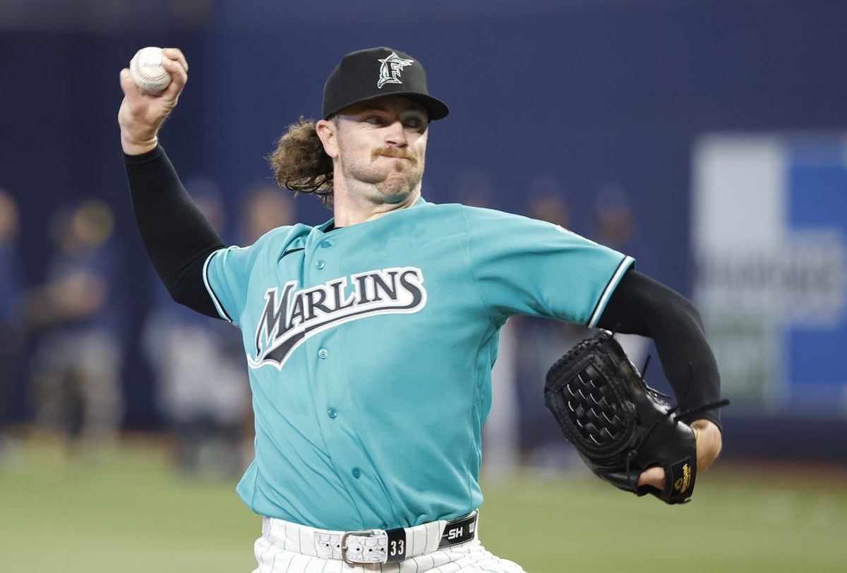 Apr 19, 2026; Miami, Florida, USA;  Miami Marlins starting pitcher Chris Paddack (33) warms up during batting practice against the Milwaukee Brewers at loanDepot Park. Mandatory Credit: Rhona Wise-Imagn Images