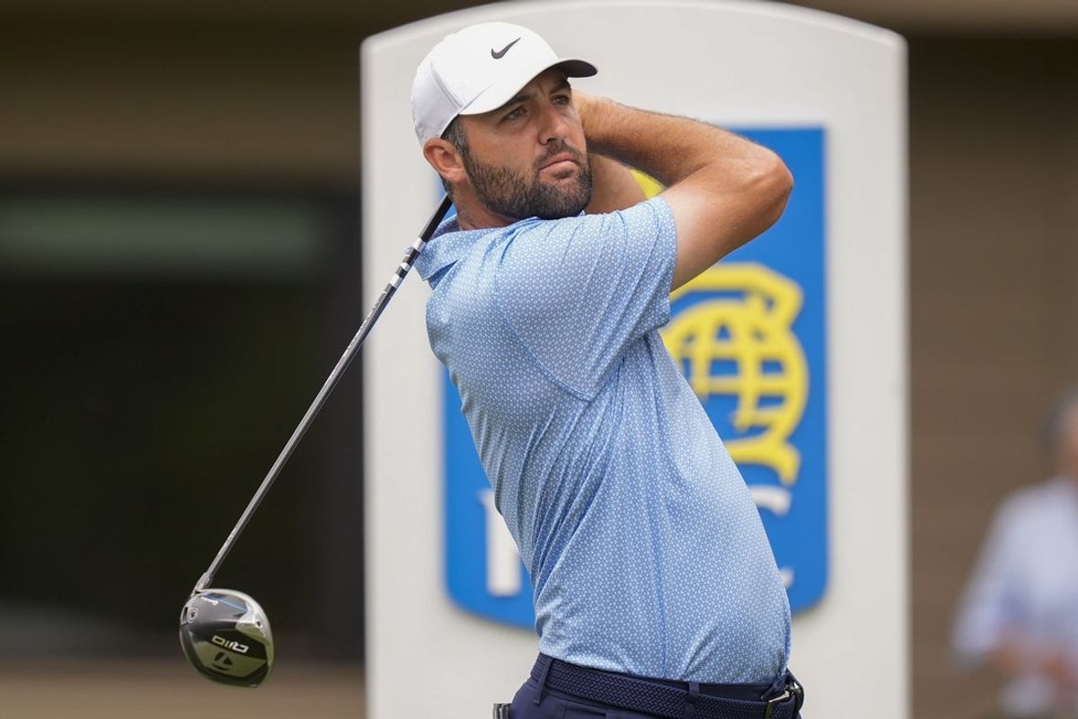 Apr 18, 2026; Hilton Head, South Carolina, USA; Scottie Scheffler drives the ball on the third hole during the final round of the RBC Heritage golf tournament. Mandatory Credit: Jim Dedmon-Imagn Images