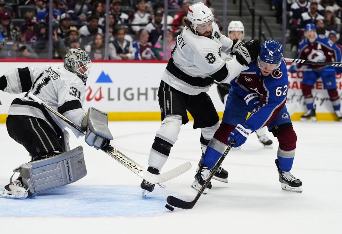 Apr 19, 2026; Denver, Colorado, USA; Colorado Avalanche left wing Artturi Lehkonen (62) scores past Los Angeles Kings defenseman Drew Doughty (8) and goaltender Anton Forsberg (31) in the second period in game one of the first round of the 2026 Stanley Cup Playoffs at Ball Arena. Mandatory Credit: Ron Chenoy-Imagn Images