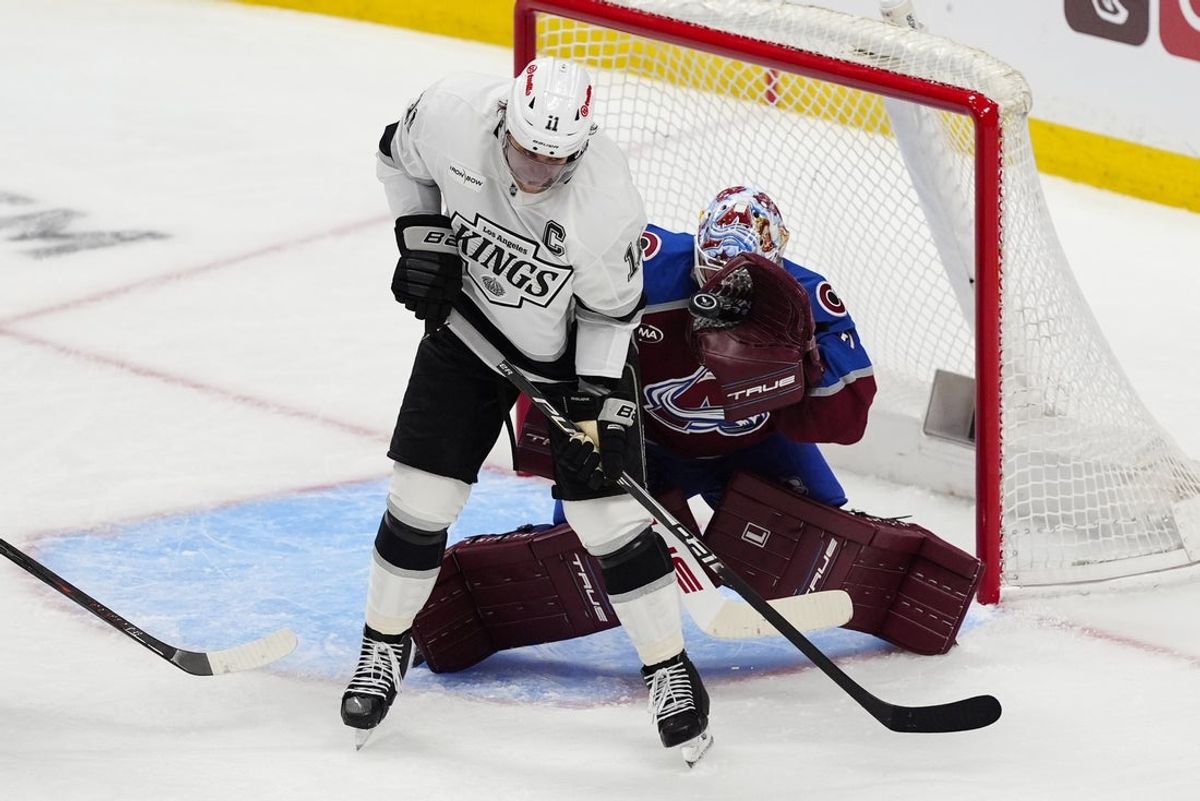 Apr 19, 2026; Denver, Colorado, USA; Colorado Avalanche goaltender Scott Wedgewood (41) makes a glove save on Los Angeles Kings center Anze Kopitar (11) in the third period in game one of the first round of the 2026 Stanley Cup Playoffs at Ball Arena. Mandatory Credit: Ron Chenoy-Imagn Images