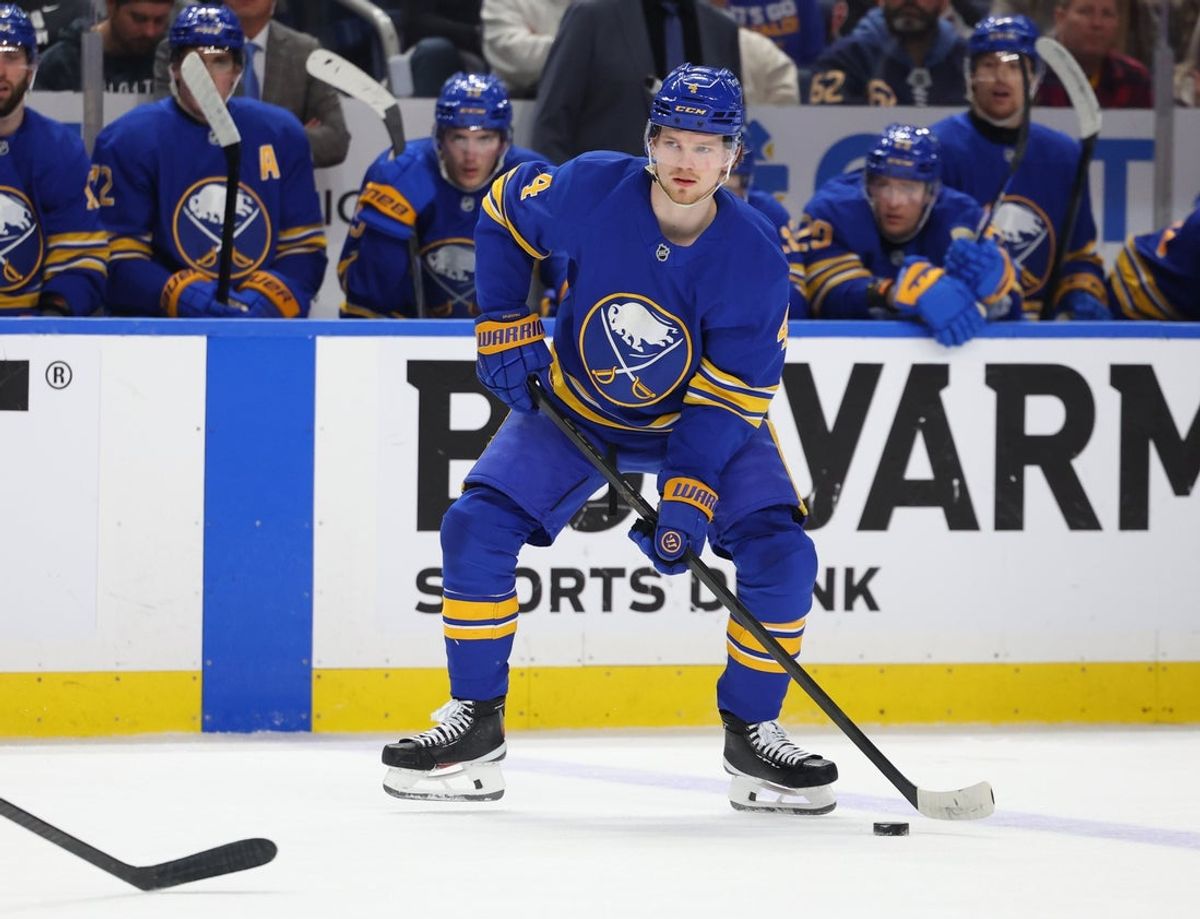 Apr 19, 2026; Buffalo, New York, USA; Buffalo Sabres defenseman Bowen Byram (4) looks to make a pass during the second period against the Boston Bruins in game one of the first round of the 2026 Stanley Cup Playoffs at KeyBank Center. Mandatory Credit: Timothy T. Ludwig-Imagn Images