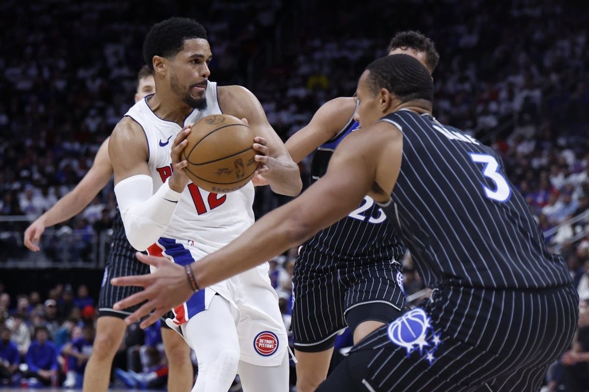 Apr 19, 2026; Detroit, Michigan, USA; Detroit Pistons forward Tobias Harris (12) is defended by Orlando Magic guard Desmond Bane (3) in the second half during the 2026 NBA Playoffs at Little Caesars Arena. Mandatory Credit: Rick Osentoski-Imagn Images