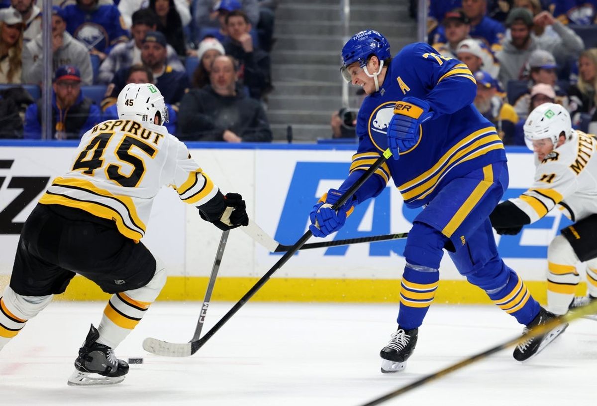 Apr 19, 2026; Buffalo, New York, USA; Boston Bruins defenseman Jonathan Aspirot (45) tries to block a shot by Buffalo Sabres center Tage Thompson (72) during the second period in game one of the first round of the 2026 Stanley Cup Playoffs at KeyBank Center. Mandatory Credit: Timothy T. Ludwig-Imagn Images