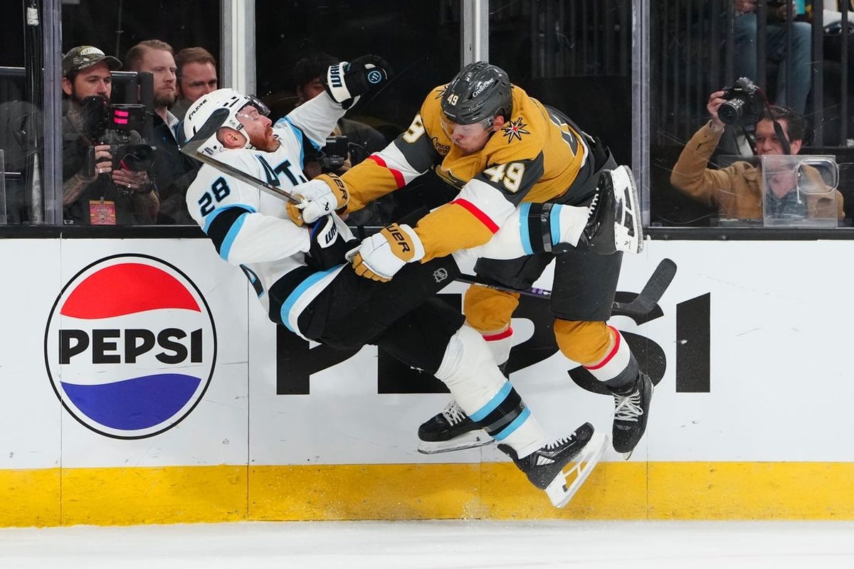 Apr 19, 2026; Las Vegas, Nevada, USA; Vegas Golden Knights left wing Ivan Barbashev (49) checks Utah Mammoth defenseman Ian Cole (28) during the first period of game one of the first round of the 2026 Stanley Cup Playoffs at T-Mobile Arena. Mandatory Credit: Stephen R. Sylvanie-Imagn Images