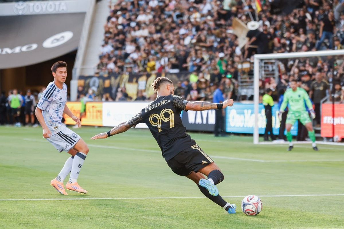Apr 19, 2026; Los Angeles, California, USA;  Los Angeles Football Club forward Denis Bouanga (99) takes a shot at goal during the match against San Jose Earthquakes at BMO Stadium. Mandatory Credit: William Navarro-Imagn Images