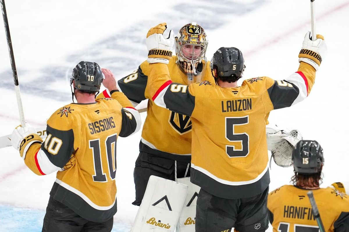 Apr 19, 2026; Las Vegas, Nevada, USA; Vegas Golden Knights goaltender Carter Hart (79) celebrates with center Colton Sissons (10) and defenseman Jeremy Lauzon (5) after the Golden Knights defeated the Utah Mammoth 4-2 in game one of the first round of the 2026 Stanley Cup Playoffs at T-Mobile Arena. Mandatory Credit: Stephen R. Sylvanie-Imagn Images