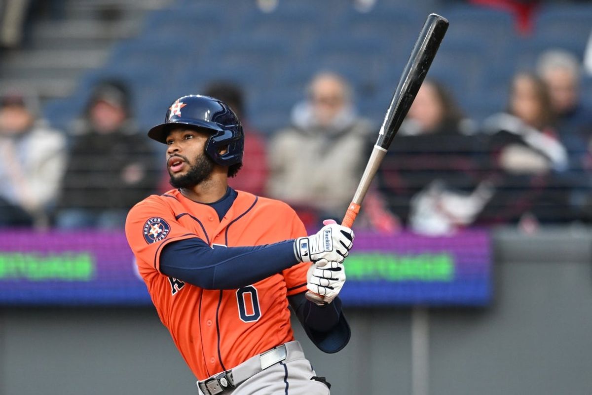 Apr 20, 2026; Cleveland, Ohio, USA; Houston Astros left fielder Brice Matthews (0) hits an RBI double during the fourth inning against the Cleveland Guardians at Progressive Field. Mandatory Credit: Ken Blaze-Imagn Images