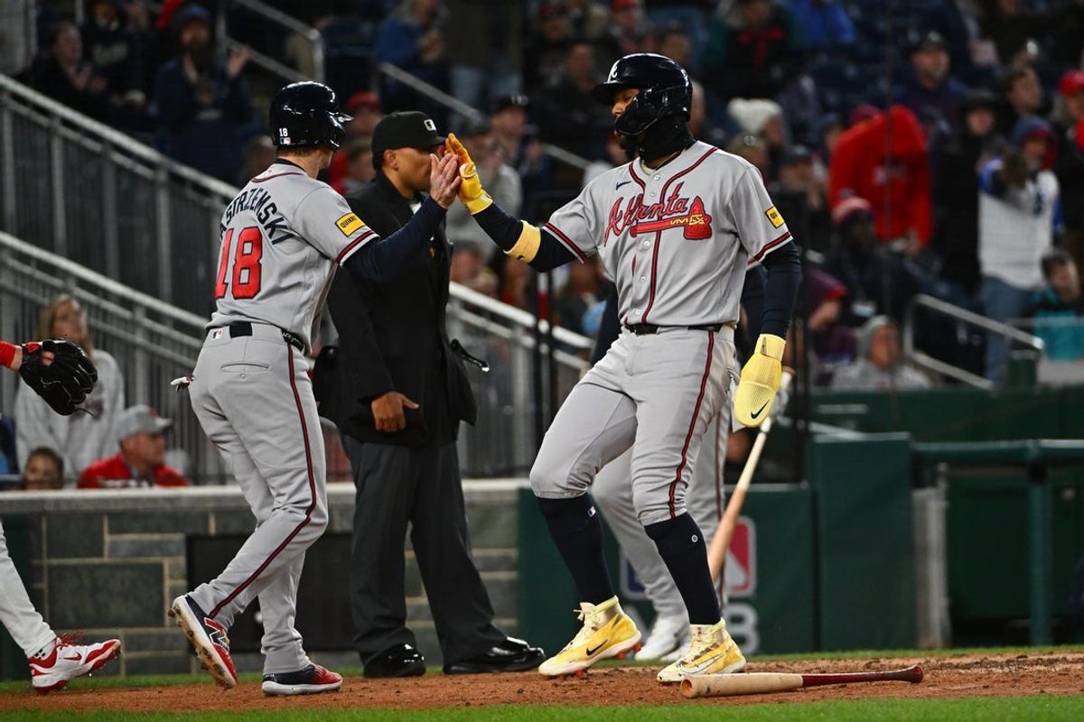 Apr 20, 2026; Washington, District of Columbia, USA; Atlanta Braves left fielder Mike Yastrzemski (18) and right fielder Ronald Acuña Jr. (13) celebrate after scoring runs against the Washington Nationals during the sixth inning at Nationals Park. Mandatory Credit: Brad Mills-Imagn Images