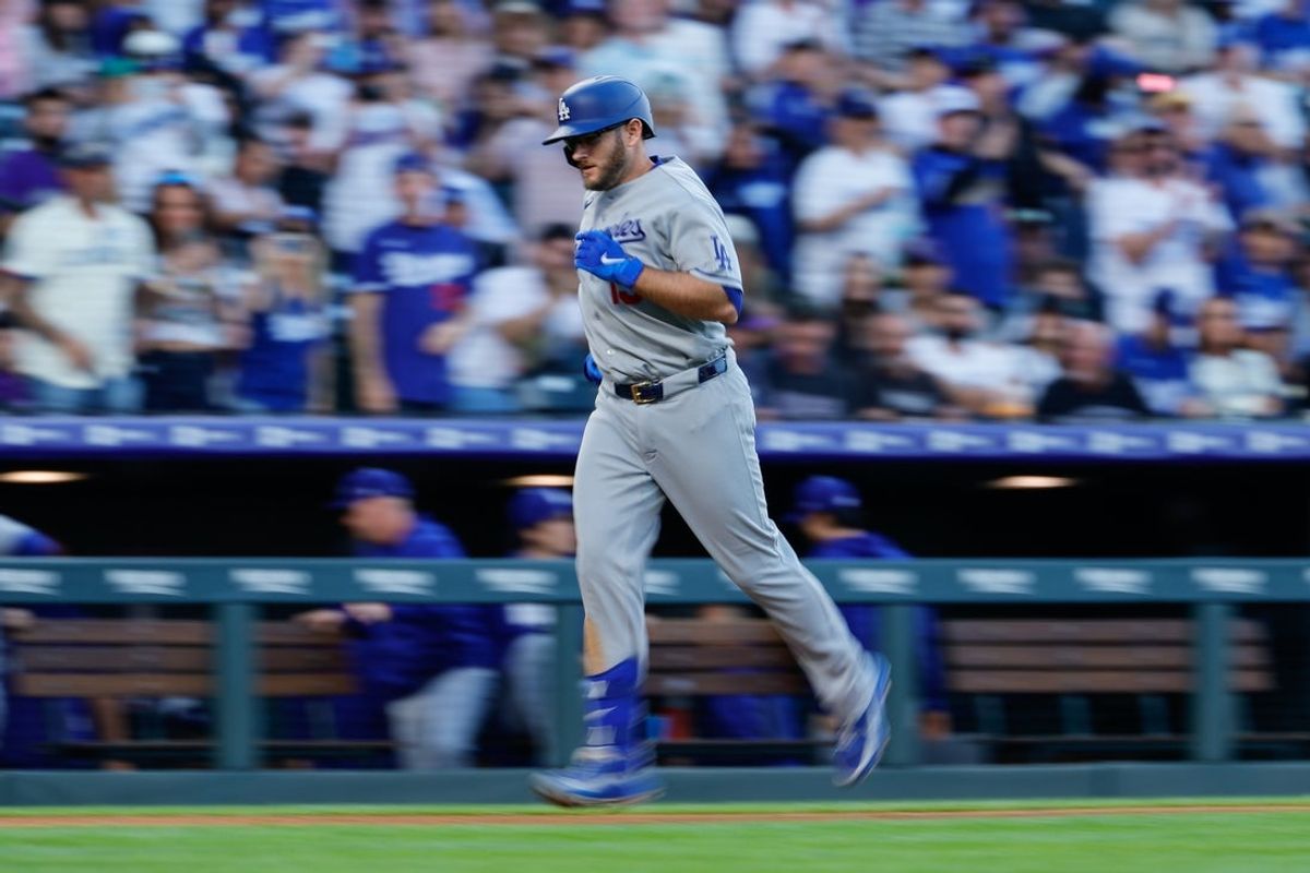 Apr 20, 2026; Denver, Colorado, USA; Los Angeles Dodgers third baseman Max Muncy (13) rounds the bases on a solo home run in the second inning against the Colorado Rockies at Coors Field. Mandatory Credit: Isaiah J. Downing-Imagn Images