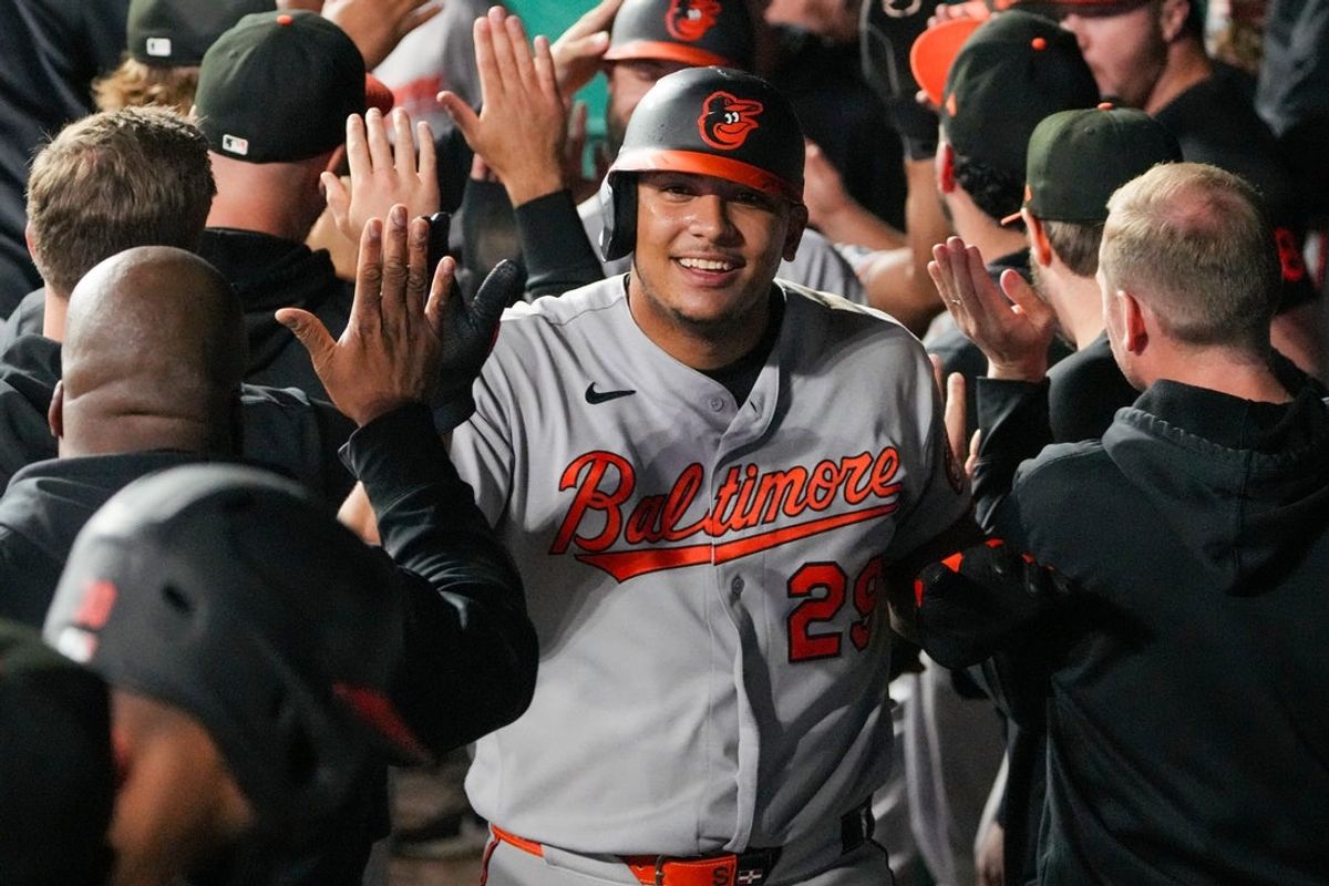 Apr 20, 2026; Kansas City, Missouri, USA; Baltimore Orioles catcher Samuel Basallo (29) celebrates with team mates after scoring in the twelfth inning against the Kansas City Royals at Kauffman Stadium. Mandatory Credit: Denny Medley-Imagn Images
