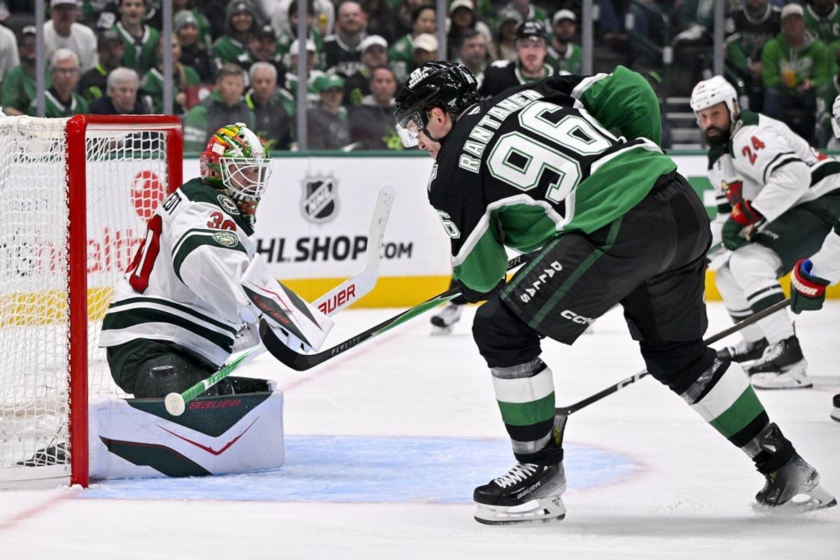 Apr 20, 2026; Dallas, Texas, USA; Minnesota Wild goaltender Jesper Wallstedt (30) stops a shot by Dallas Stars right wing Mikko Rantanen (96) during the second period in game two of the first round of the 2026 Stanley Cup Playoffs at American Airlines Center. Mandatory Credit: Jerome Miron-Imagn Images