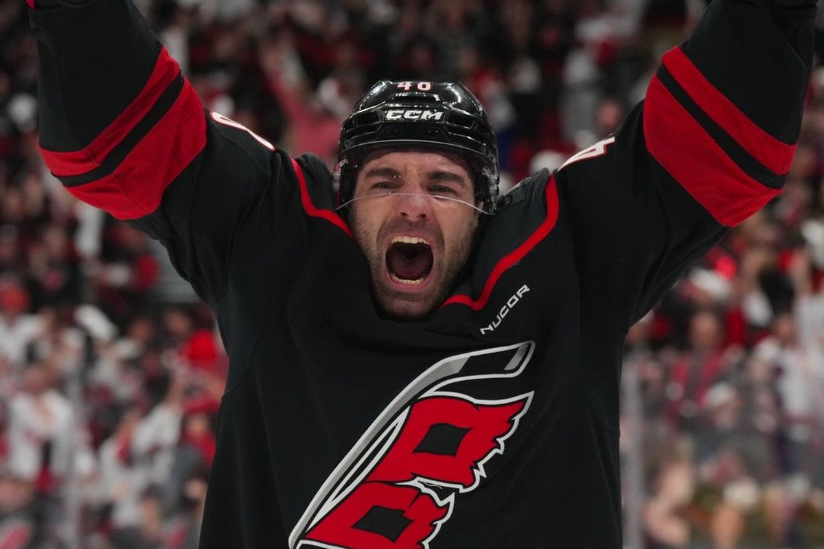 Apr 20, 2026; Raleigh, North Carolina, USA; Carolina Hurricanes left wing Jordan Martinook (48) scores the game winner in the second overtime against the Ottawa Senators in game two of the first round of the 2026 Stanley Cup Playoffs at Lenovo Center. Mandatory Credit: James Guillory-Imagn Images