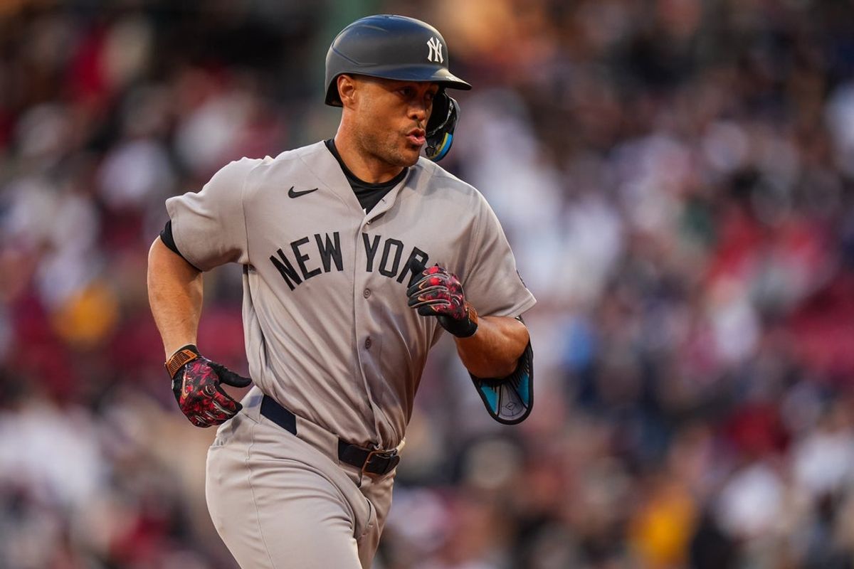 Apr 21, 2026; Boston, Massachusetts, USA; New York Yankees designated hitter Giancarlo Stanton (27) rounds the bases after hitting a home run against the Boston Red Sox in the second inning at Fenway Park. Mandatory Credit: David Butler II-Imagn Images