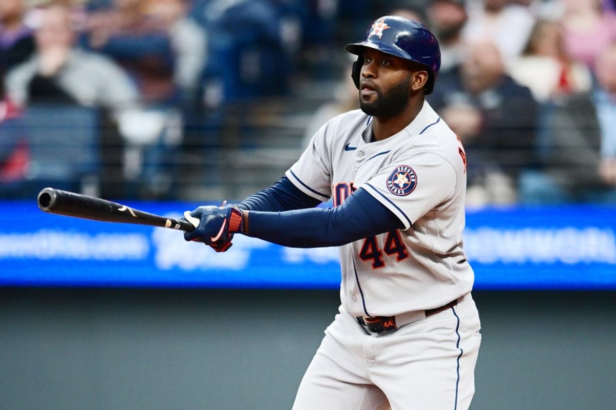Apr 21, 2026; Cleveland, Ohio, USA; Houston Astros designated hitter Yordan Alvarez (44) hits an RBI double against the Cleveland Guardians during the fifth inning at Progressive Field. Mandatory Credit: Ken Blaze-Imagn Images