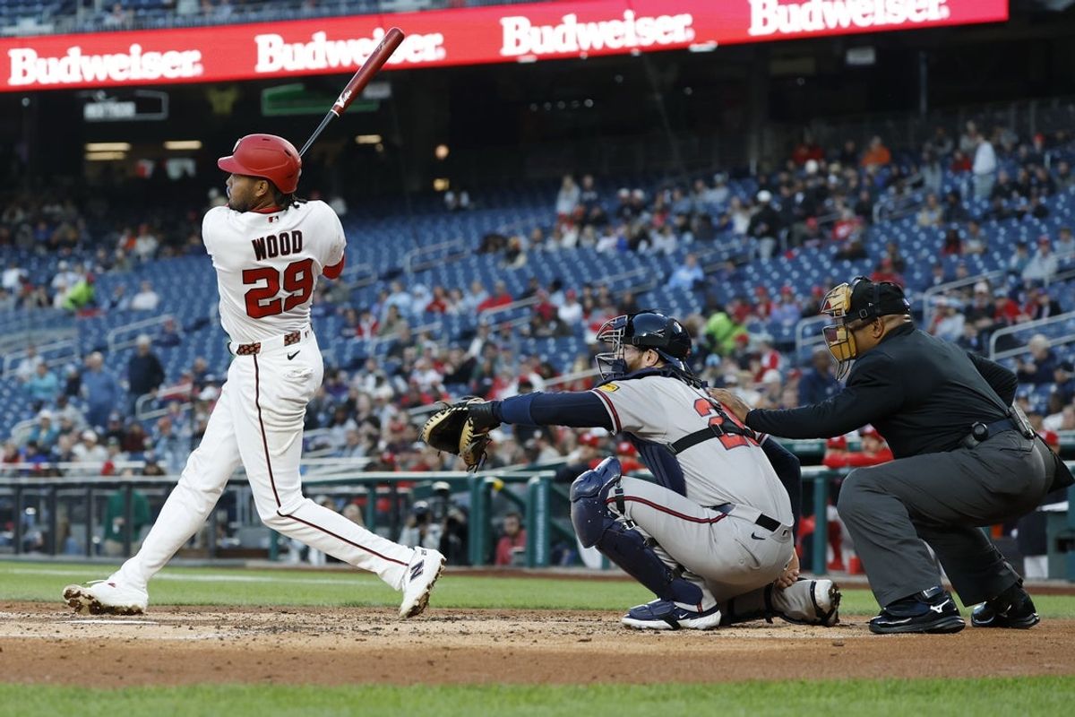 Apr 21, 2026; Washington, District of Columbia, USA; Washington Nationals left fielder James Wood (29) hits a solo home run against the Atlanta Braves during the second inning at Nationals Park. Mandatory Credit: Geoff Burke-Imagn Images