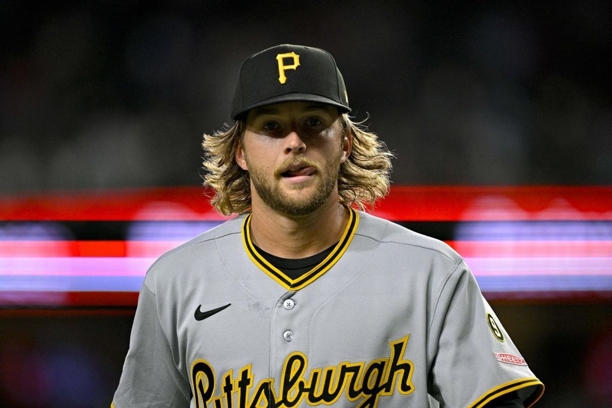 Apr 21, 2026; Arlington, Texas, USA; Pittsburgh Pirates starting pitcher Carmen Mlodzinski (50) comes off the field after he pitches against the Texas Rangers during the first inning at Globe Life Field. Mandatory Credit: Jerome Miron-Imagn Images