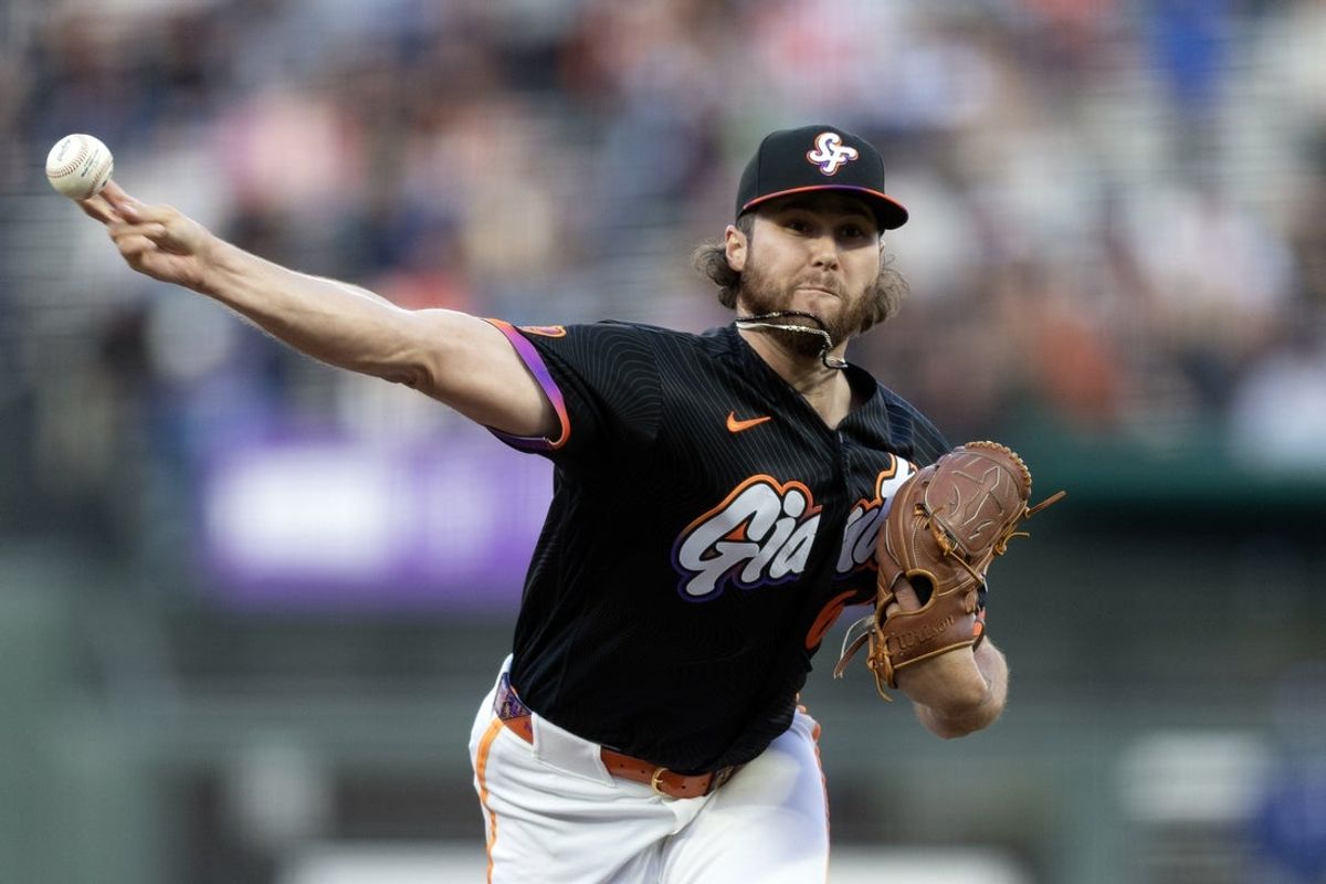 Apr 21, 2026; San Francisco, California, USA; San Francisco Giants starting pitcher Landen Roupp (65) throws against the Los Angeles Dodgers during the first inning at Oracle Park. Mandatory Credit: D. Ross Cameron-Imagn Images