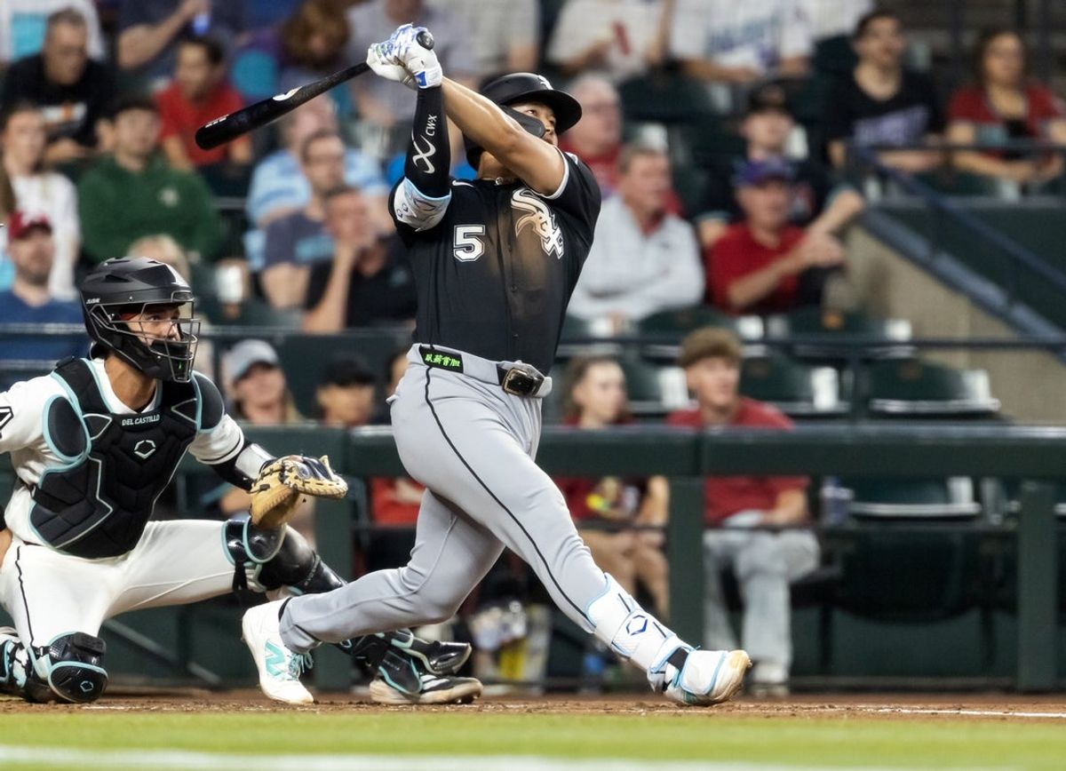Apr 21, 2026; Phoenix, Arizona, USA; Chicago White Sox first baseman Munetaka Murakami hits a home run in the second inning against the Arizona Diamondbacks at Chase Field. Mandatory Credit: Mark J. Rebilas-Imagn Images
