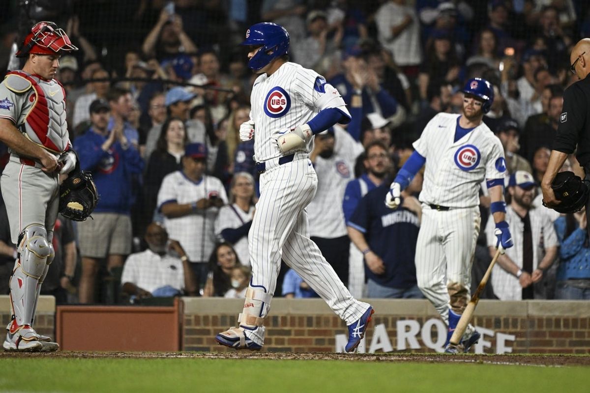 Apr 21, 2026; Chicago, Illinois, USA;  Chicago Cubs right fielder Seiya Suzuki (27) runs the bases after hitting a home run against the Philadelphia Phillies during the seventh inning at Wrigley Field. Mandatory Credit: Matt Marton-Imagn Images