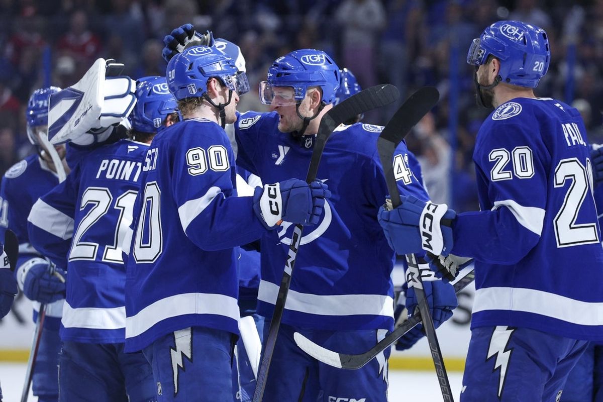 Apr 21, 2026; Tampa, Florida, USA; Tampa Bay Lightning defenseman J.J. Moser (90) and defenseman Darren Raddysh (43) react after beating the Montreal Canadiens in overtime during game two of the first round of the 2026 Stanley Cup Playoffs at Benchmark International Arena. Mandatory Credit: Nathan Ray Seebeck-Imagn Images