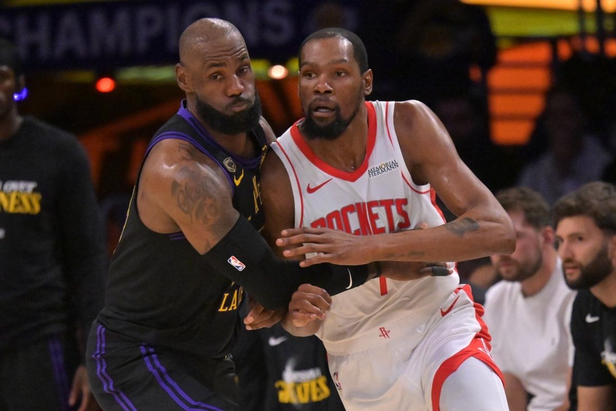 Apr 21, 2026; Los Angeles, California, USA; Los Angeles Lakers forward LeBron James (23) defends Houston Rockets forward Kevin Durant (7) in the first half of game two of the first round of the 2026 NBA Playoffs against the Houston Rockets at Crypto.com Arena. Mandatory Credit: Jayne Kamin-Oncea-Imagn Images