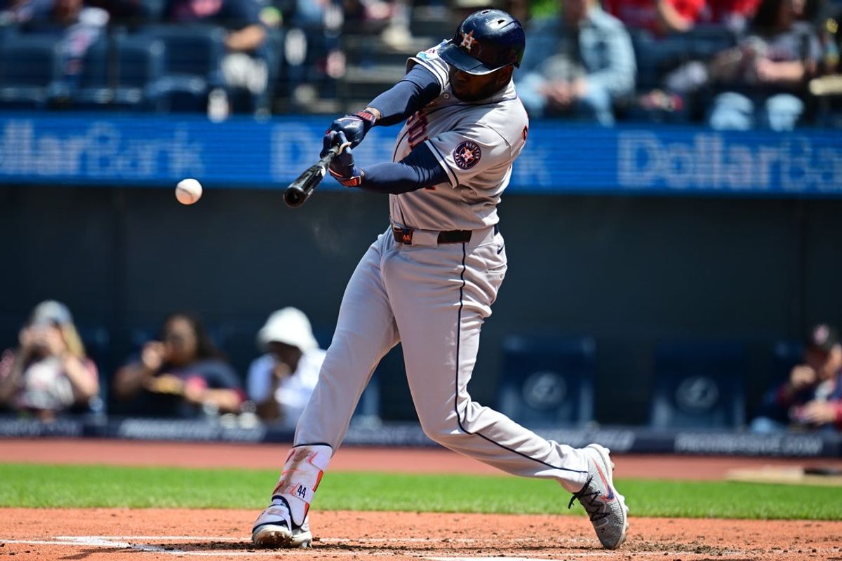 Apr 22, 2026; Cleveland, Ohio, USA; Houston Astros left fielder Yordan Alvarez (44) hits a single during the third inning against the Cleveland Guardians at Progressive Field. Mandatory Credit: David Dermer-Imagn Images