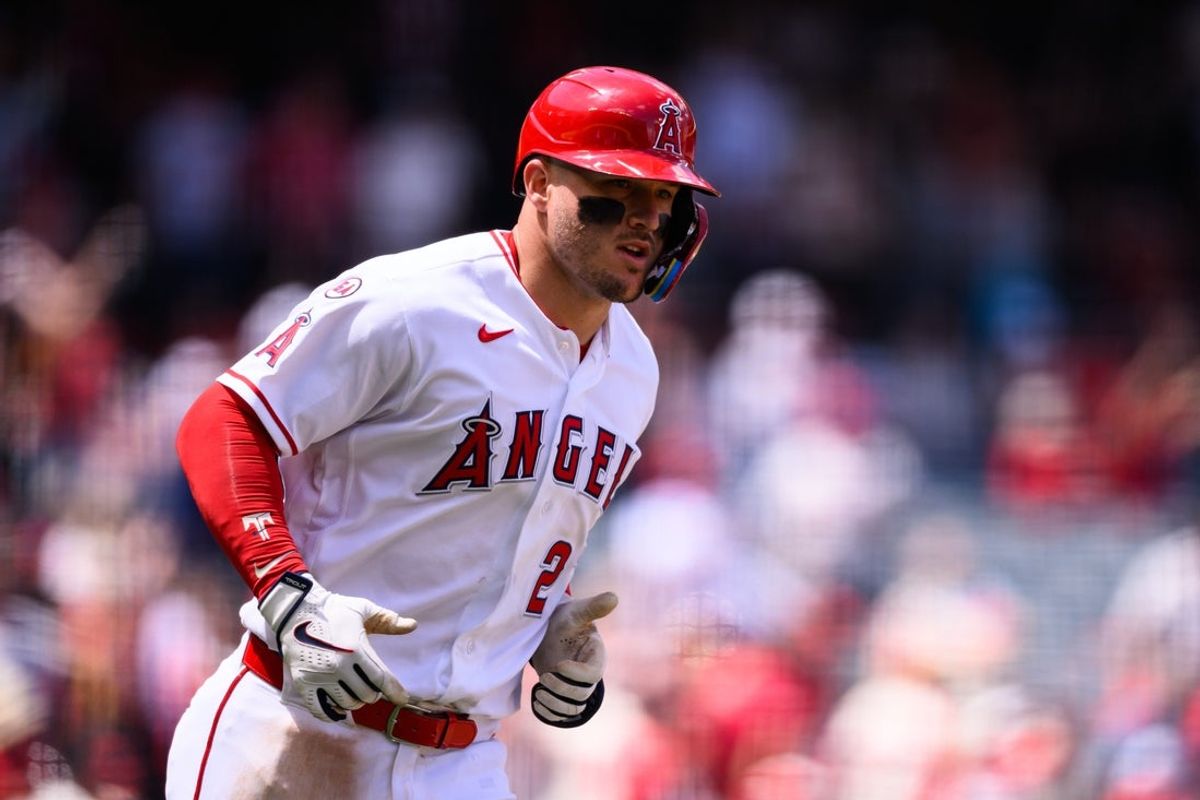 Apr 22, 2026; Anaheim, California, USA; Los Angeles Angels designated hitter Mike Trout (27) runs after hitting a home run during the fifth inning against the Toronto Blue Jays at Angel Stadium. Mandatory Credit: William Liang-Imagn Images