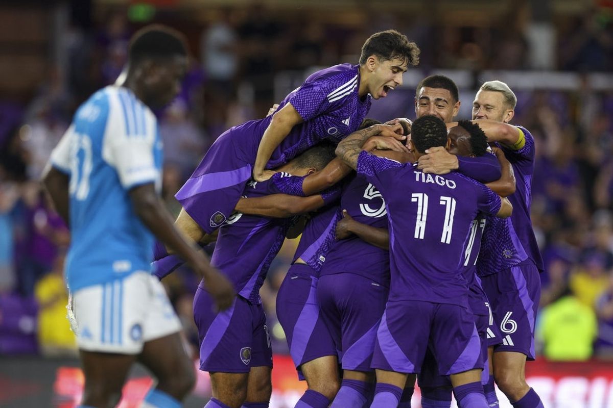 Apr 22, 2026; Orlando, Florida, USA; Orlando City SC defender Zakaria Taifi (19) celebrates a goal by midfielder Luis Otavio (5) against Charlotte FC in the first half at Inter&Co Stadium. Mandatory Credit: Nathan Ray Seebeck-Imagn Images