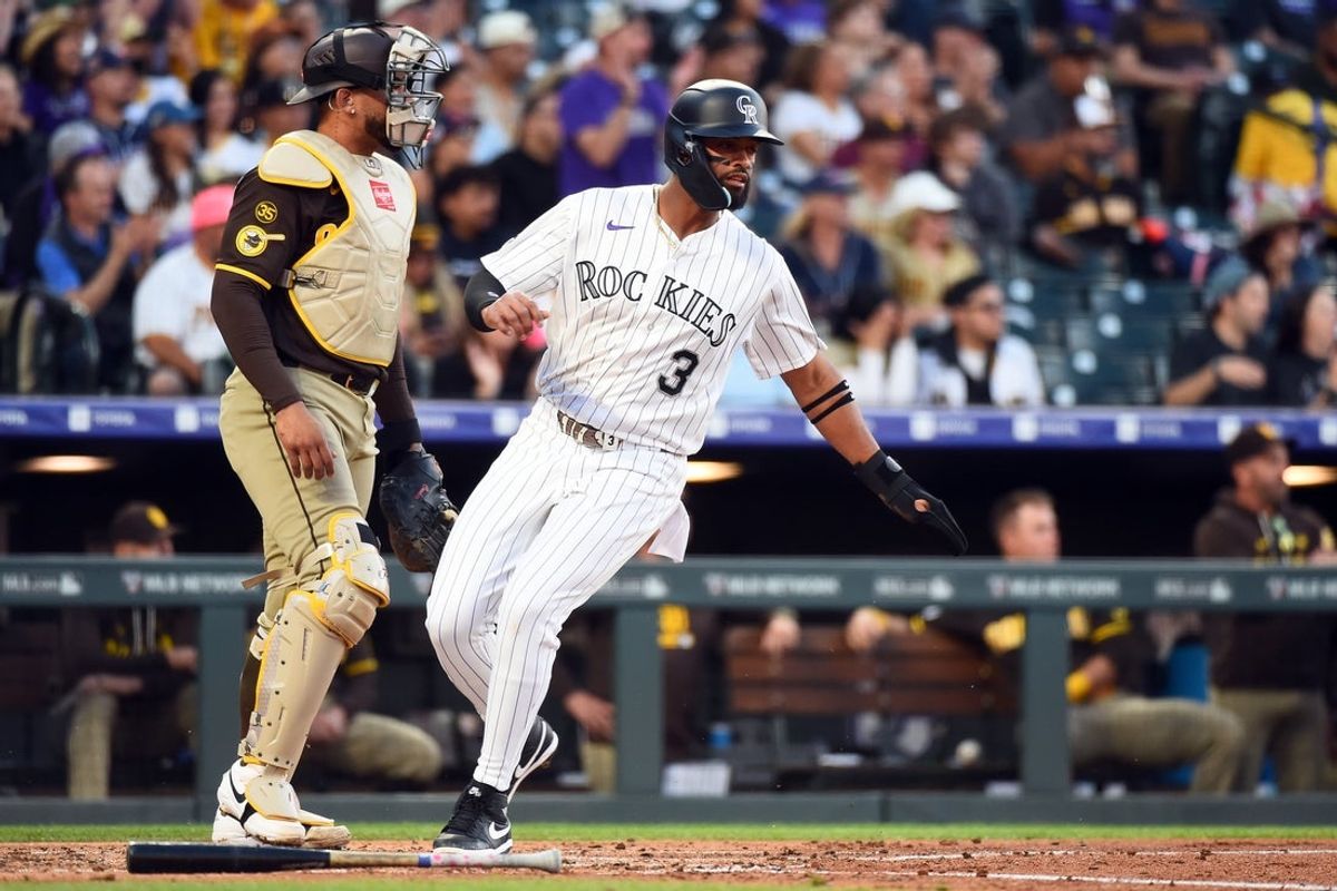 Apr 22, 2026; Denver, Colorado, USA; Colorado Rockies outfielder Willi Castro (3) scores during the second inning against the San Diego Padres at Coors Field. Mandatory Credit: Christopher Hanewinckel-Imagn Images