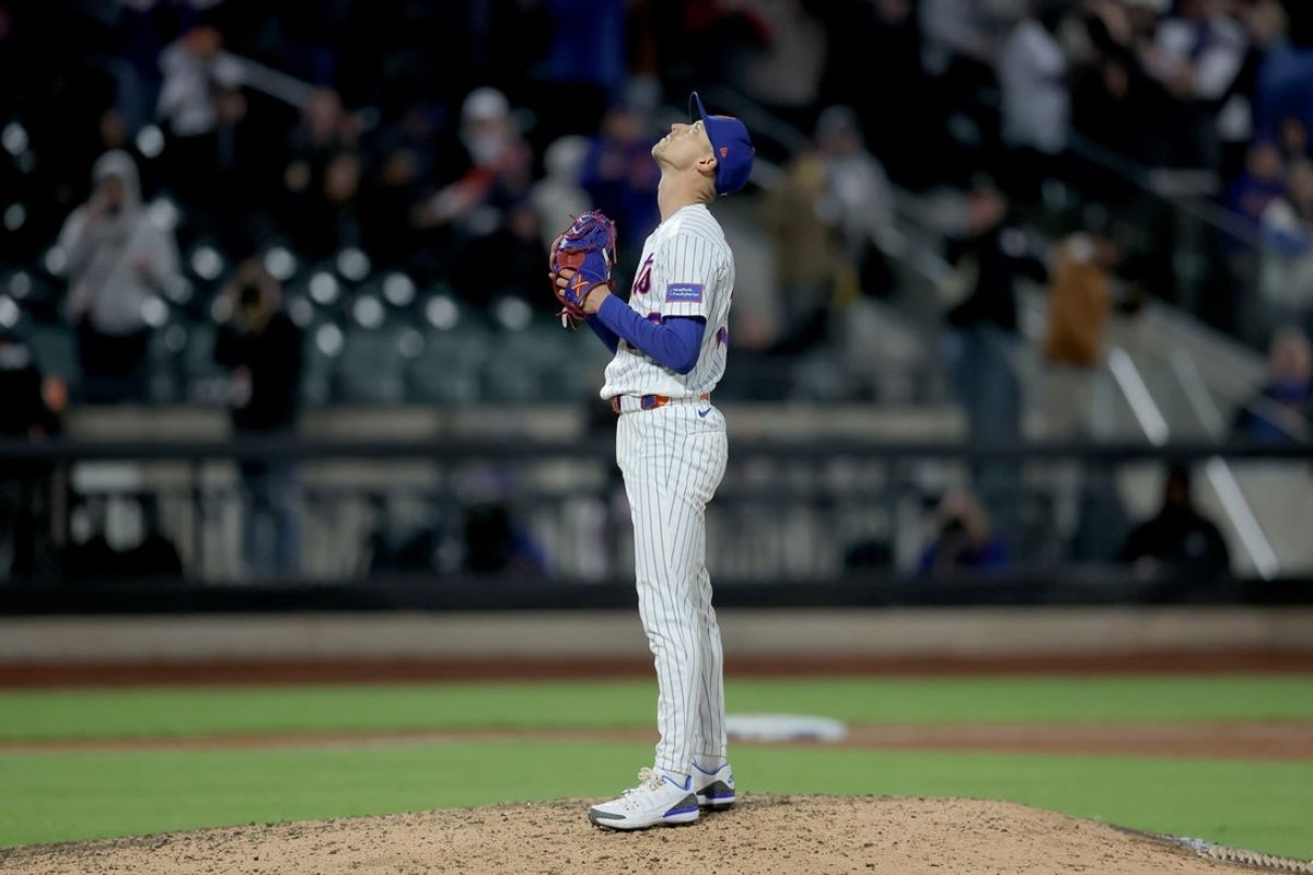 Apr 22, 2026; New York City, New York, USA; New York Mets relief pitcher Luke Weaver (30) reacts after defeating the Minnesota Twins at Citi Field. Mandatory Credit: Brad Penner-Imagn Images