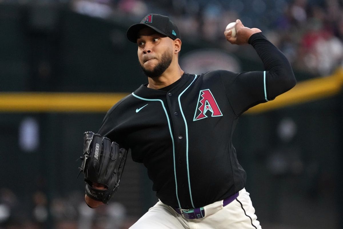 Apr 22, 2026; Phoenix, Arizona, USA; Arizona Diamondbacks starting pitcher Eduardo Rodriguez (57) throws against the Chicago White Sox in the first inning at Chase Field. Mandatory Credit: Rick Scuteri-Imagn Images