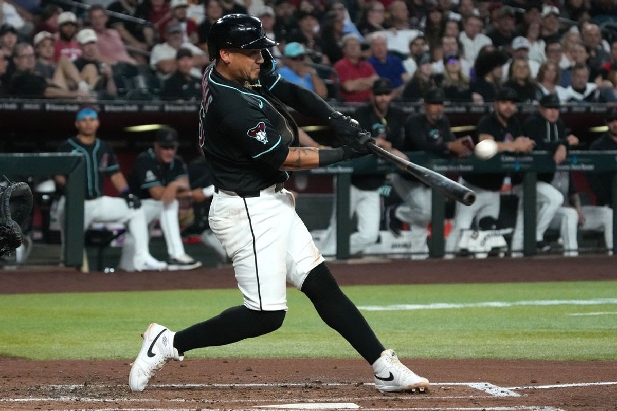 Apr 22, 2026; Phoenix, Arizona, USA; Arizona Diamondbacks second baseman Ildemaro Vargas (6) hits a three run home run against the Chicago White Sox in the second inning at Chase Field. Mandatory Credit: Rick Scuteri-Imagn Images