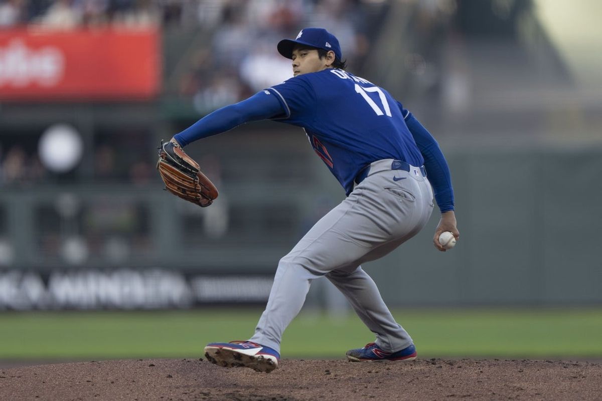 Apr 22, 2026; San Francisco, California, USA;  Los Angeles Dodgers two-way player Shohei Ohtani (17) pitches during the first inning against the San Francisco Giants at Oracle Park. Mandatory Credit: Stan Szeto-Imagn Images