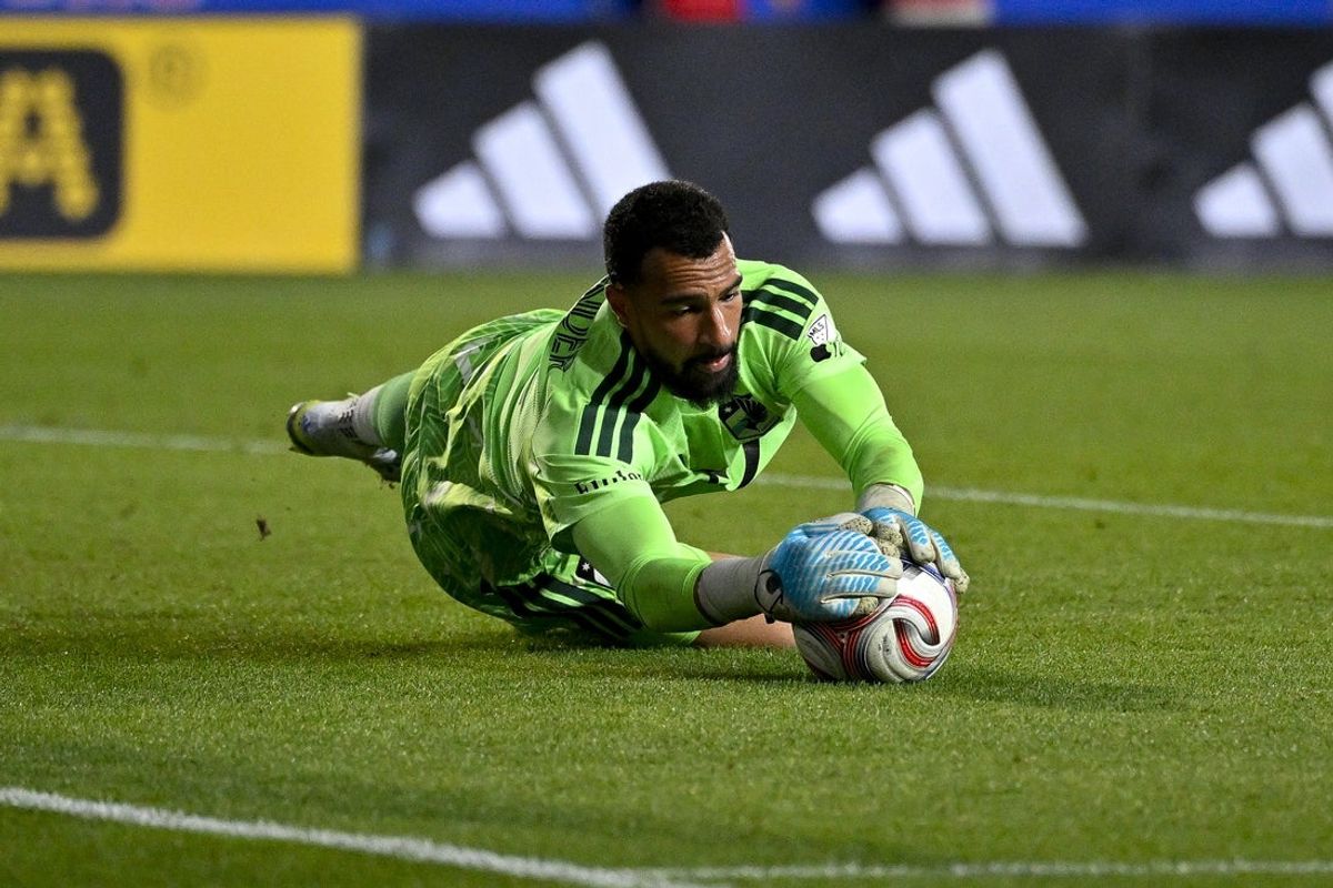 Apr 22, 2026; Frisco, Texas, USA; Minnesota United FC goalkeeper Drake Callender (12) makes a save on a FC Dallas shot during the second half at Toyota Stadium. Mandatory Credit: Jerome Miron-Imagn Images