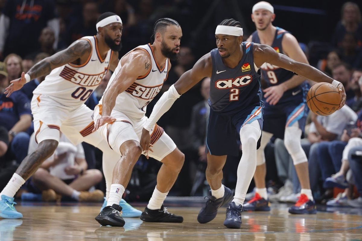 Apr 22, 2026; Oklahoma City, Oklahoma, USA; Oklahoma City Thunder guard Shai Gilgeous-Alexander (2) drives around Phoenix Suns forward Dillon Brooks (3) in the first half during game two of the first round of the 2026 NBA Playoffs at Paycom Center. Mandatory Credit: Alonzo Adams-Imagn Images