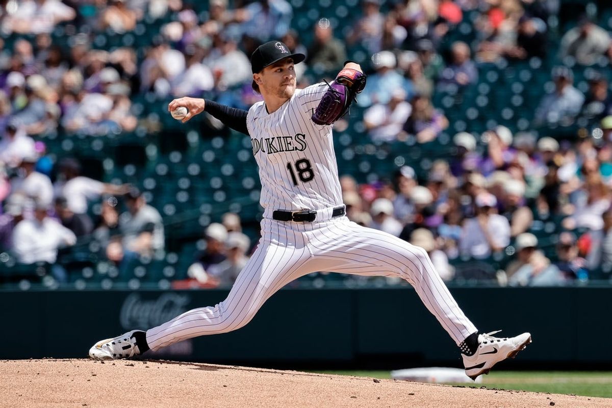 Apr 23, 2026; Denver, Colorado, USA; Colorado Rockies starting pitcher Ryan Feltner (18) pitches in the first inning against the San Diego Padres at Coors Field. Mandatory Credit: Isaiah J. Downing-Imagn Images