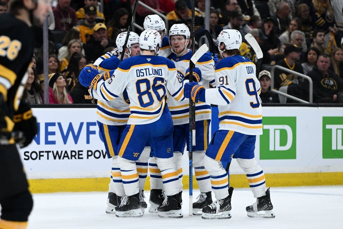 Apr 23, 2026; Boston, Massachusetts, USA; Buffalo Sabres defenseman Bowen Byram (4) celebrates with his teammates after scoring a goal against the Boston Bruins during the second period of game three of the first round of the 2026 Stanley Cup Playoffs at the TD Garden. Mandatory Credit: Brian Fluharty-Imagn Images