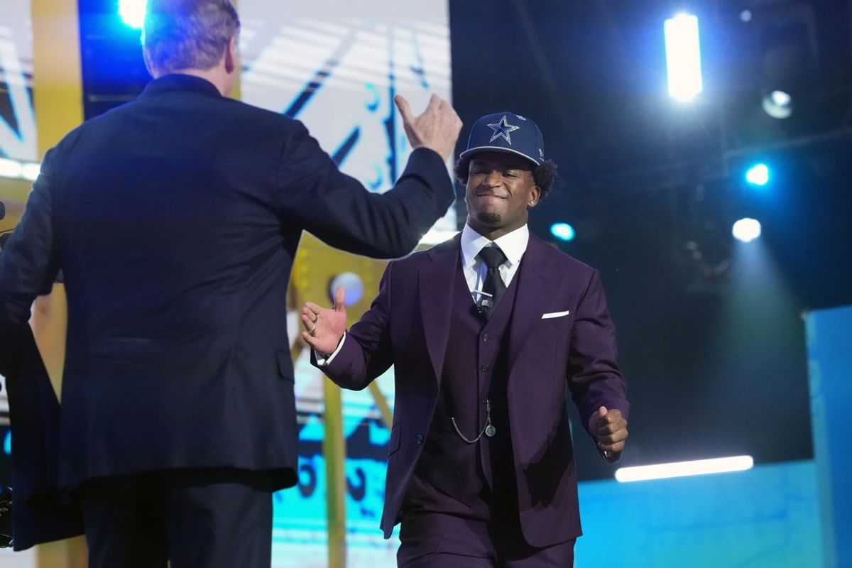 Apr 23, 2026; Pittsburgh, PA, USA; Ohio State Buckeyes defensive back Caleb Downs is selected by the Dallas Cowboys as the number eleven pick during the 2026 NFL Draft at Acrisure Stadium. Mandatory Credit: Kirby Lee-Imagn Images