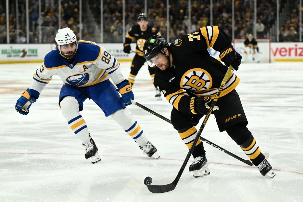 Apr 23, 2026; Boston, Massachusetts, USA; Boston Bruins left wing Viktor Arvidsson (71) skates against Buffalo Sabres right wing Alex Tuch (89) during the third period of game three of the first round of the 2026 Stanley Cup Playoffs at the TD Garden. Mandatory Credit: Brian Fluharty-Imagn Images