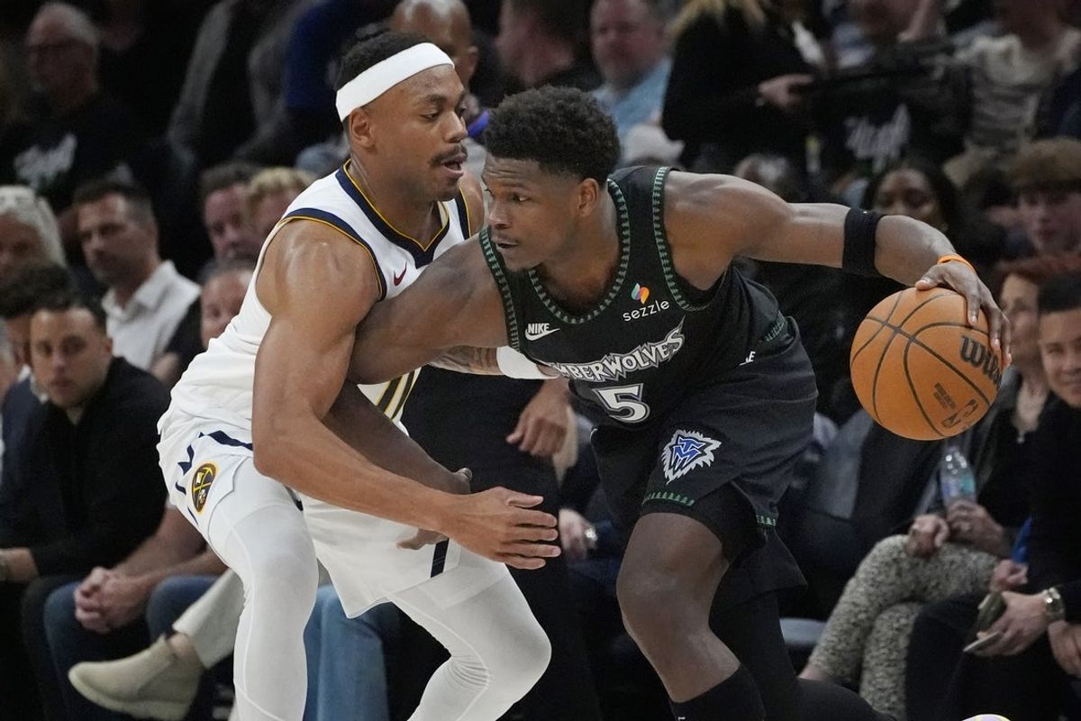 Apr 23, 2026; Minneapolis, Minnesota, USA;  Minnesota Timberwolves guard Anthony Edwards (5) works around Denver Nuggets guard Bruce Brown (11) in the fourth quarter at Target Center. Mandatory Credit: Bruce Kluckhohn-Imagn Images