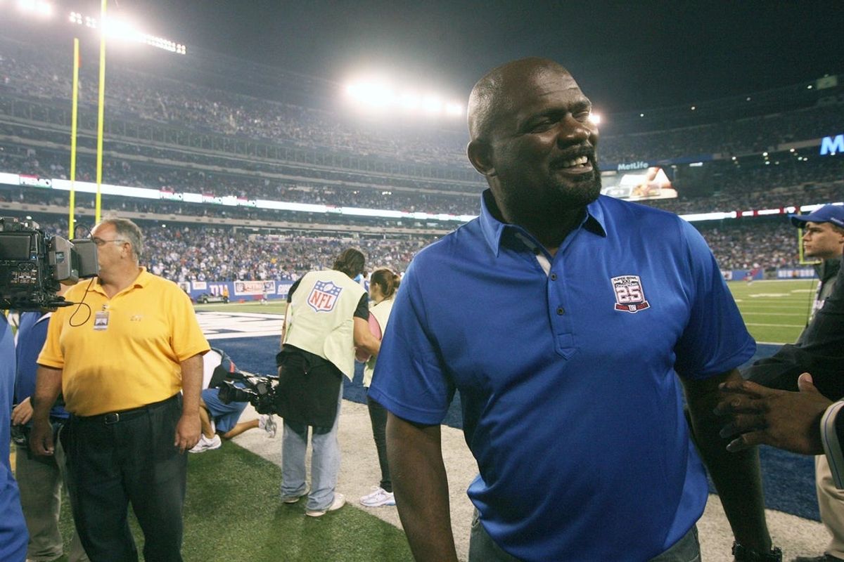 St. Louis Rams vs New York Giants -- The 1986 Giants were honored for their Super Bowl at halftime. Here is Lawrence Taylor at the conclusion of the ceremony, September 19, 2011.