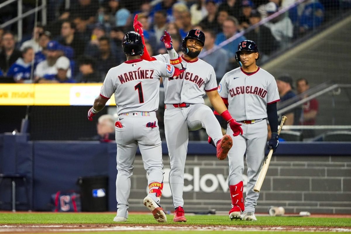 Apr 24, 2026; Toronto, Ontario, CAN; Cleveland Guardians center fielder Angel Martínez (1) celebrates hitting a home run against the Toronto Blue Jays during the first inning with teammates at Rogers Centre. Mandatory Credit: Kevin Sousa-Imagn Images