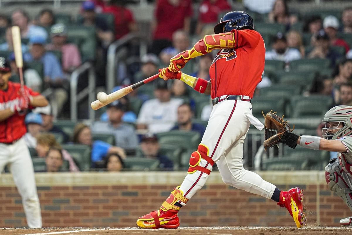 Apr 24, 2026; Cumberland, Georgia, USA; Atlanta Braves right fielder Ronald Acuna Jr. (13) hits a home run against the Philadelphia Phillies during the third inning at Truist Park. Mandatory Credit: Dale Zanine-Imagn Images