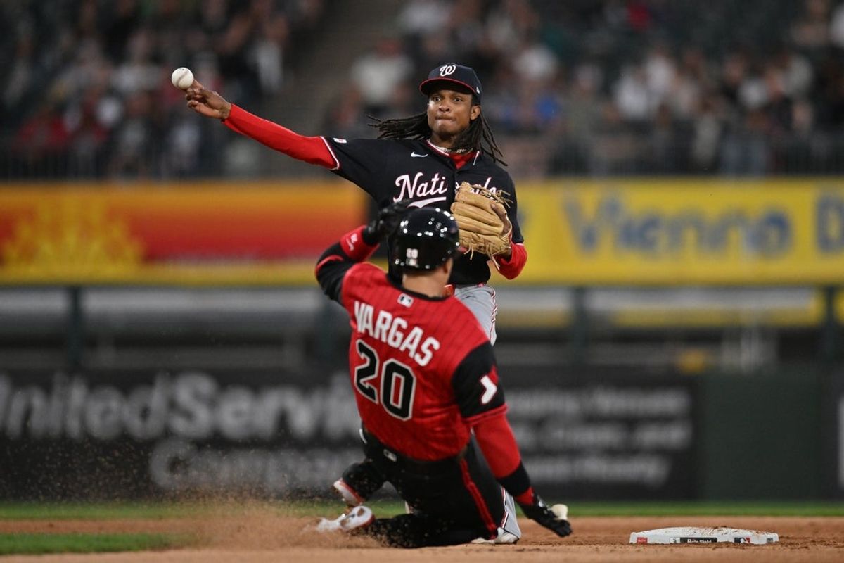Apr 24, 2026; Chicago, Illinois, USA; Washington Nationals shortstop CJ Abrams (5) completes a double play after forcing out Chicago White Sox third baseman Miguel Vargas (20) during the fourth inning at Rate Field. Mandatory Credit: Patrick Gorski-Imagn Images