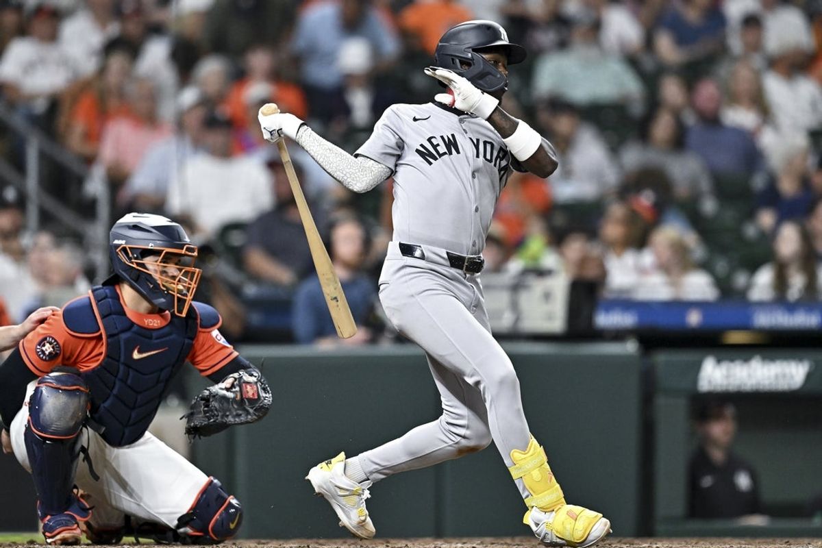 Apr 24, 2026; Houston, Texas, USA; New York Yankees second baseman Jazz Chisholm Jr. (13) hits a double in the in the seventh inning one run scores against the Houston Astros at Daikin Park. Mandatory Credit: Maria Lysaker-Imagn Images