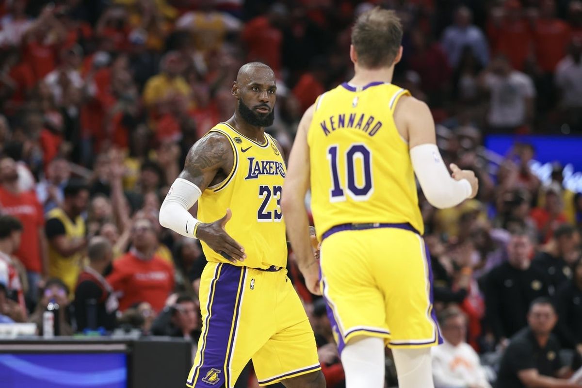 Apr 24, 2026; Houston, Texas, USA; Los Angeles Lakers forward LeBron James (23) celebrates with guard Luke Kennard (10) after scoring a basket during the fourth quarter against the Houston Rockets during game three of the first round of the 2026 NBA Playoffs at Toyota Center. Mandatory Credit: Troy Taormina-Imagn Images