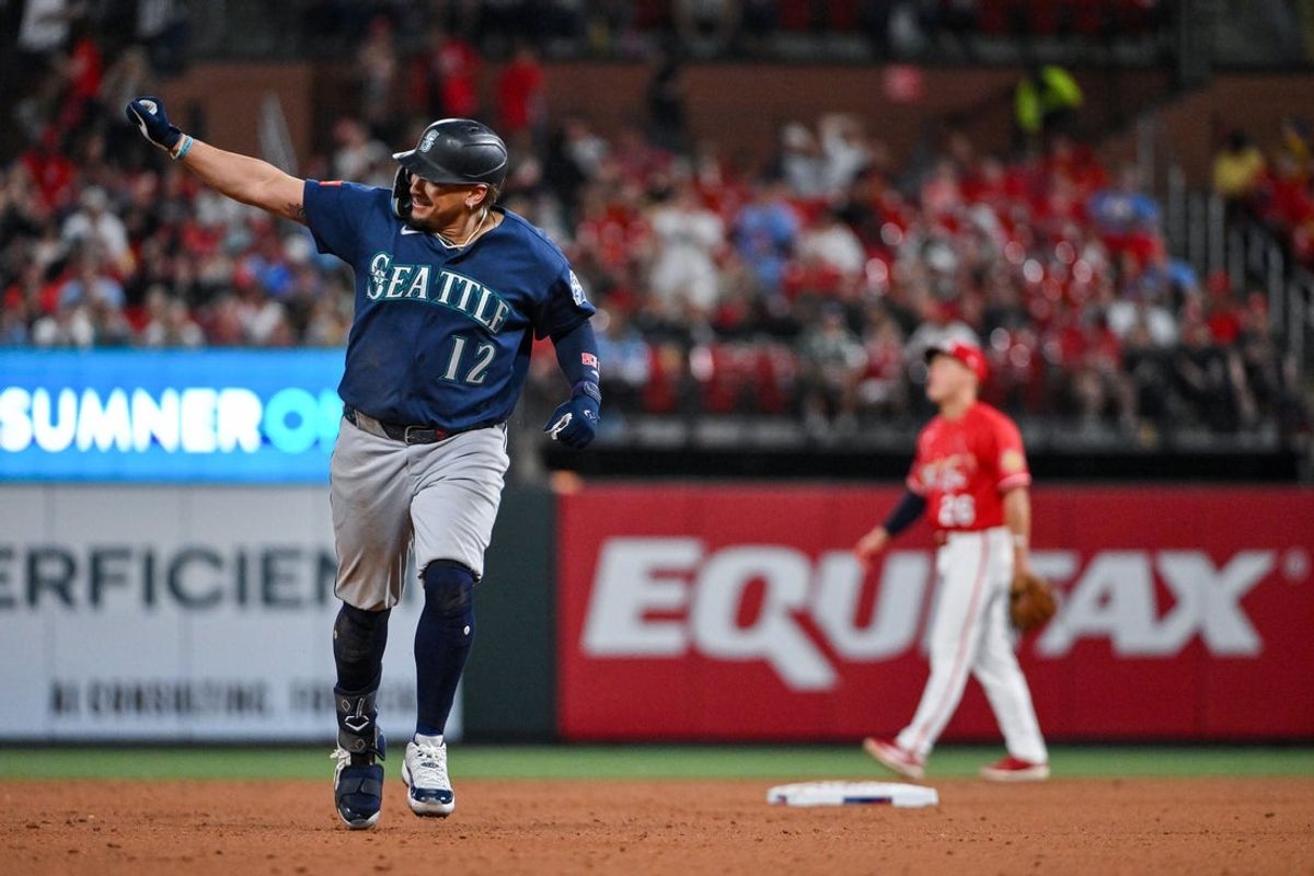 Apr 24, 2026; St. Louis, Missouri, USA; Seattle Mariners first baseman Josh Naylor (12) reacts as he runs the bases after hitting a solo home run against the St. Louis Cardinals during the sixth inning at Busch Stadium. Mandatory Credit: Jeff Curry-Imagn Images