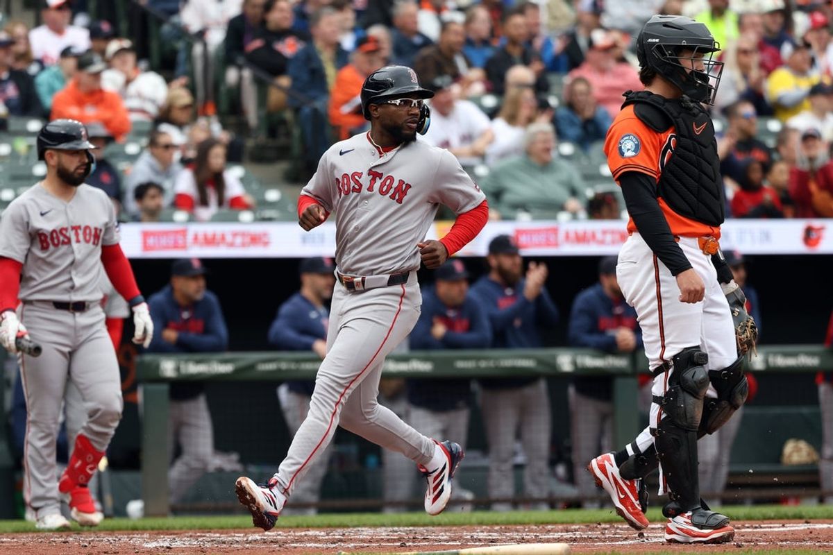 Apr 25, 2026; Baltimore, Maryland, USA; Boston Red Sox designated hitter Andruw Monasterio (32) scores during the second inning against the Baltimore Orioles at Oriole Park at Camden Yards. Mandatory Credit: Daniel Kucin Jr.-Imagn Images